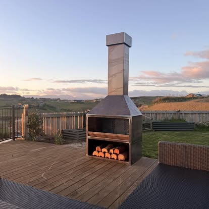 Corten steel outdoor fireplace showing its developed patina